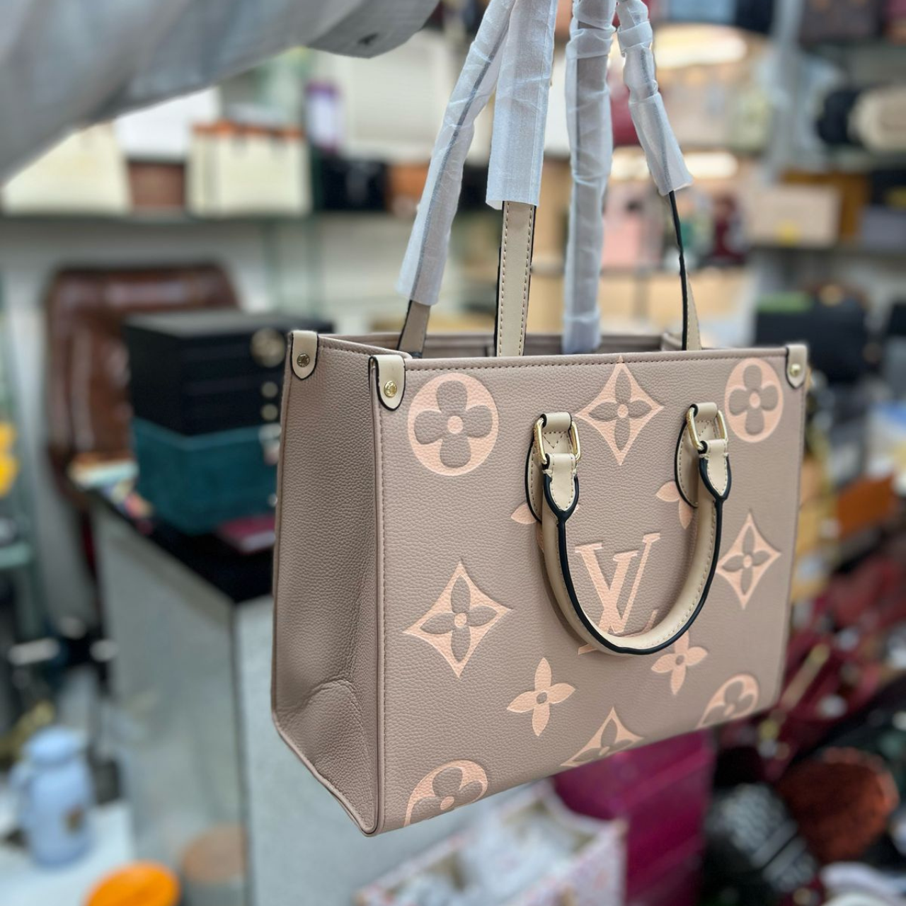 LV ON THE GO TOTE BAG
