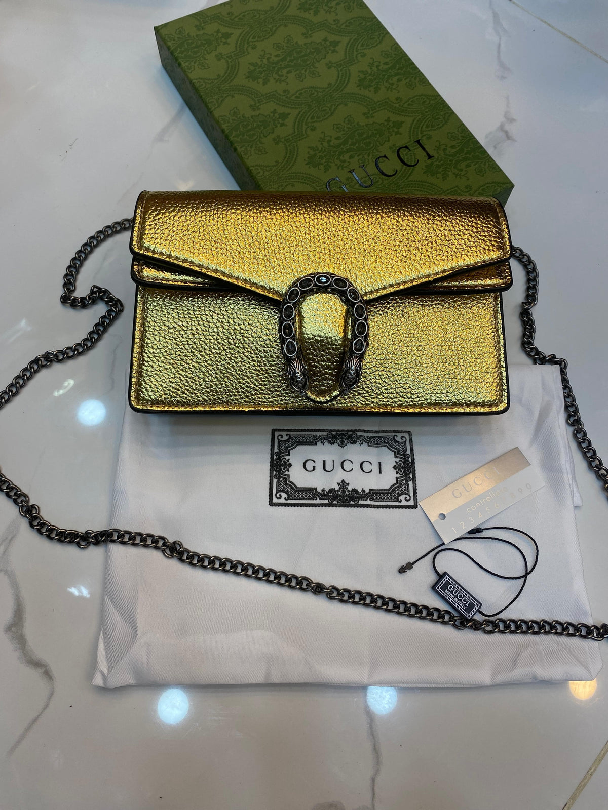 Gucci dynosus gold